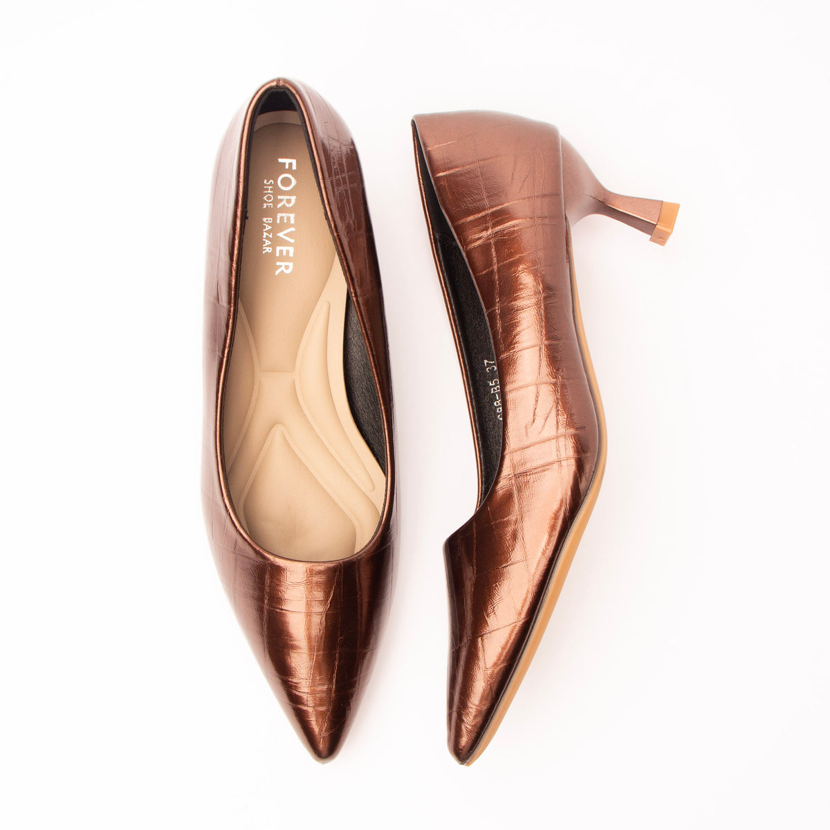 Brown pumps for women, both shoes laid flat
