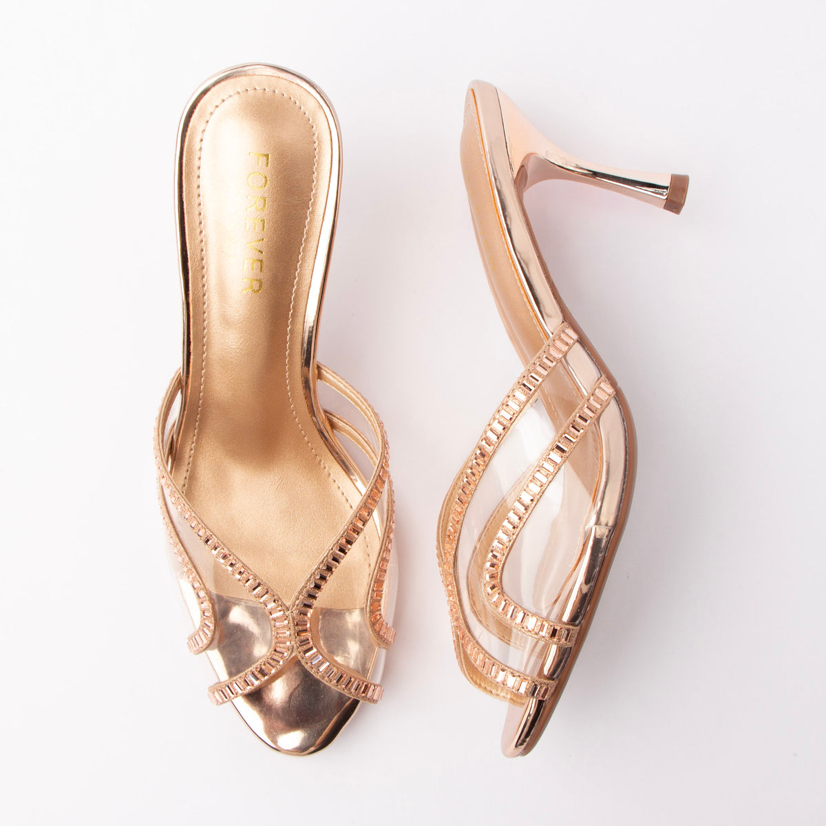 Champagne mules for women, both shoes laid flat