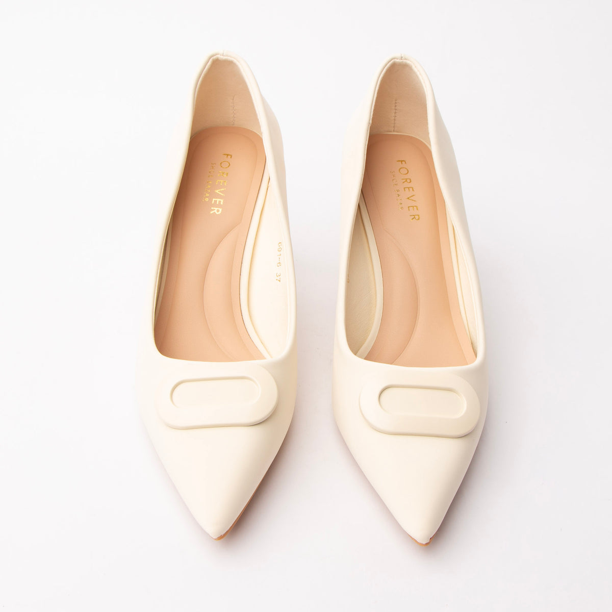 Beige buckle court shoes styled for everyday wear