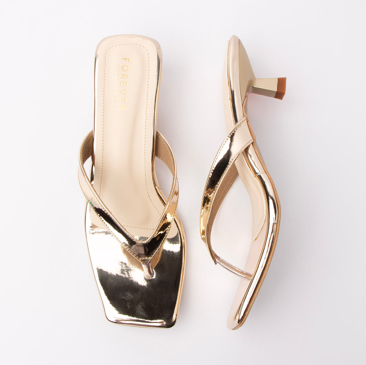 Gold toe-post kitten heel mules for women, both shoes laid flat