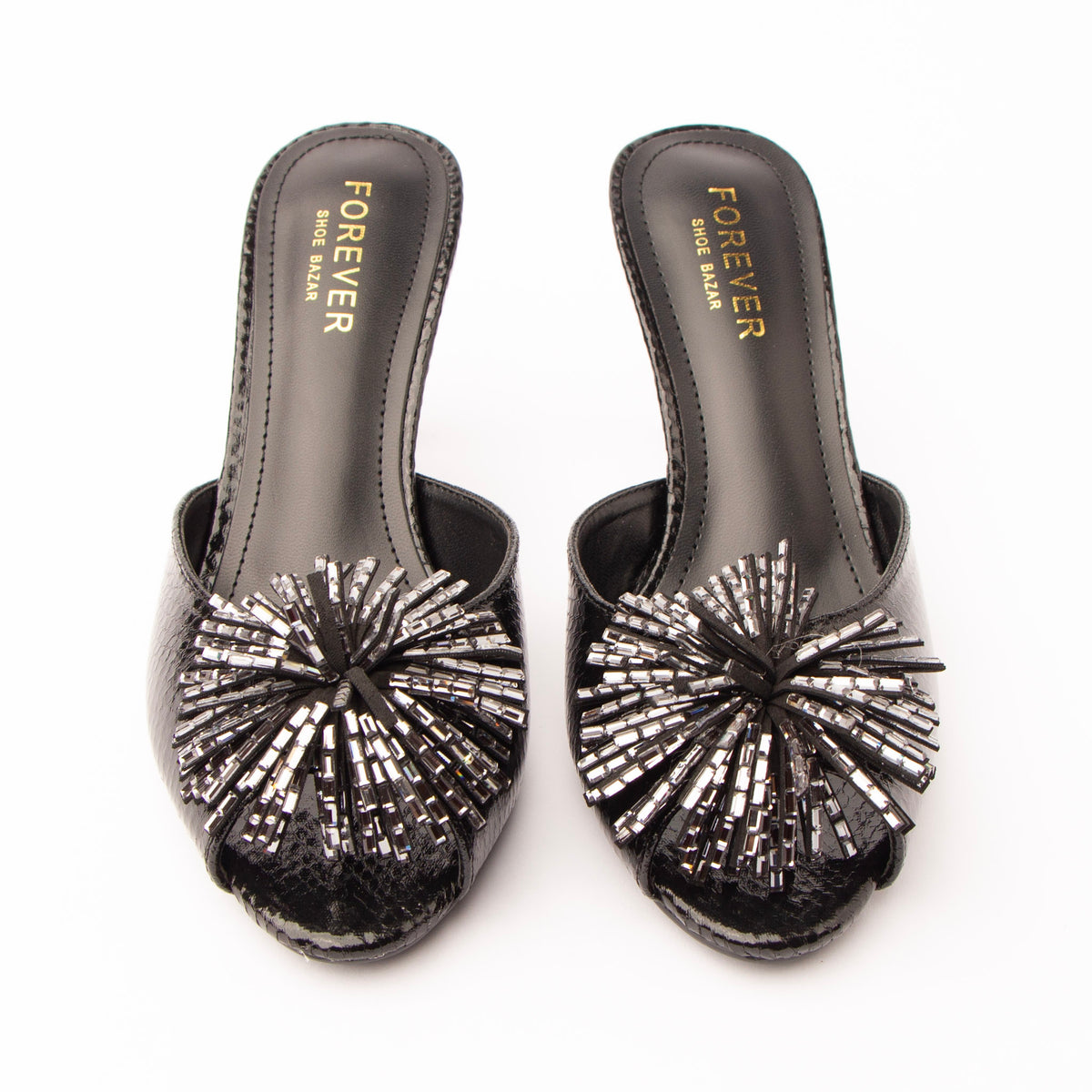 Black mules for women, both shoes from the front