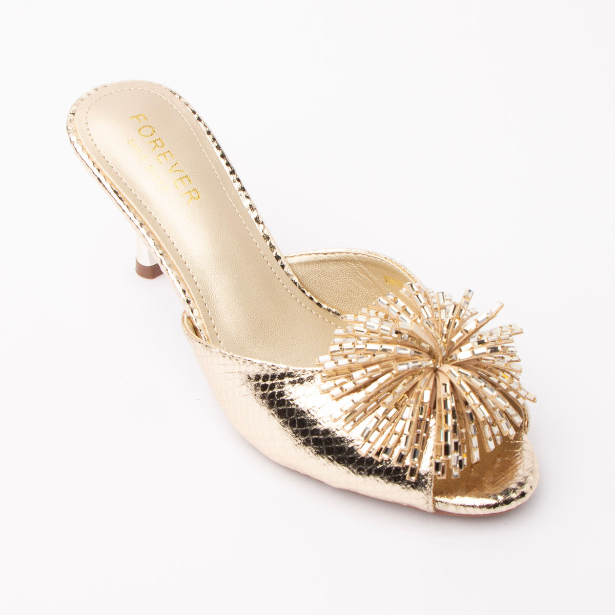 Gold mules for women, three-quarter view