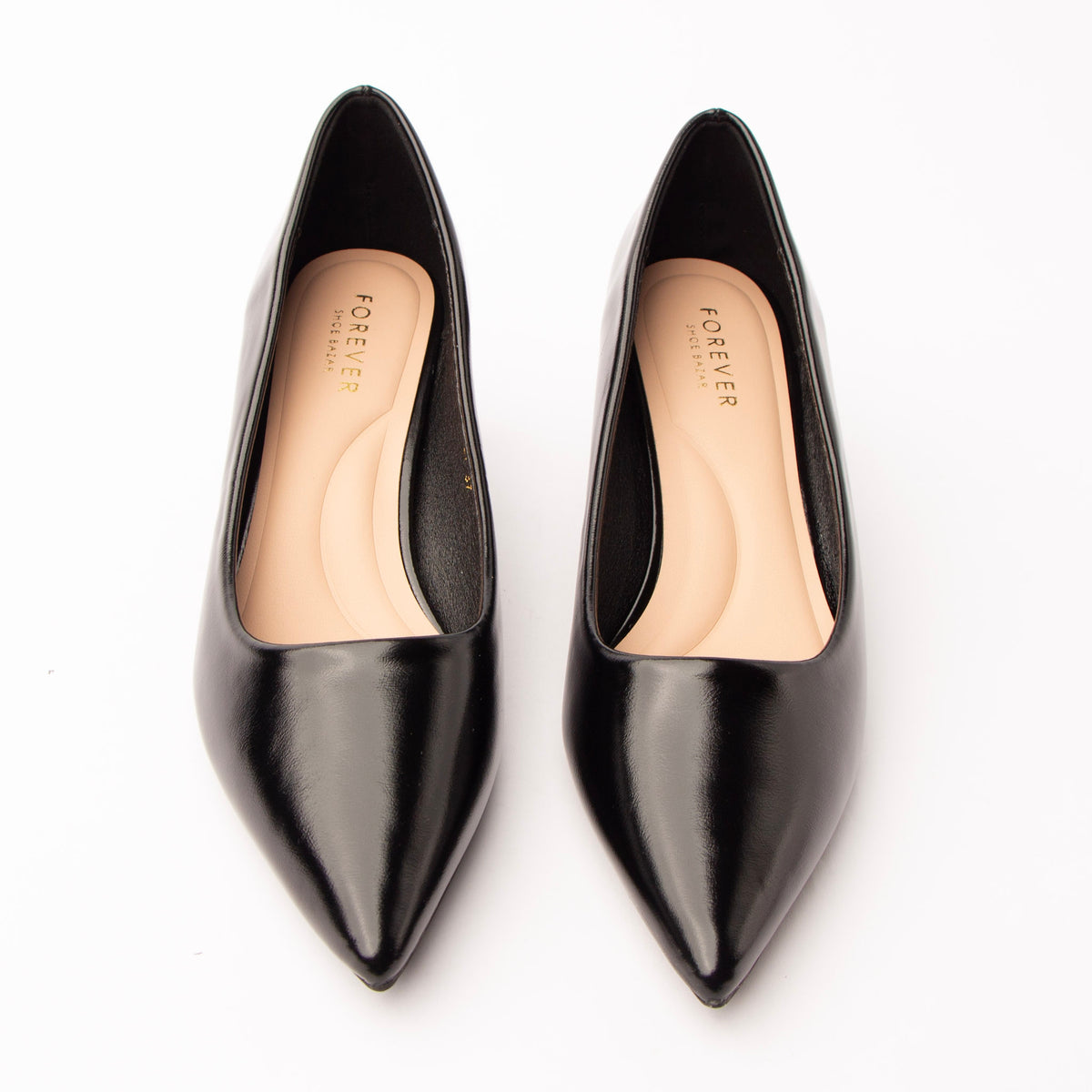Black pointed court shoes styled for everyday wear