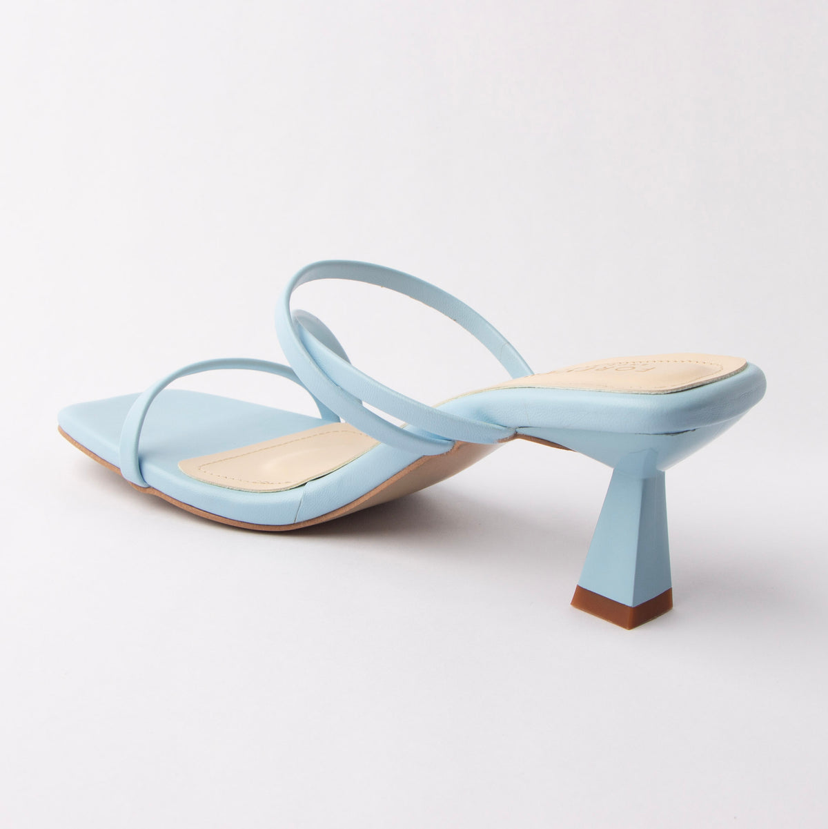 Blue mules for women, back view showing the heel