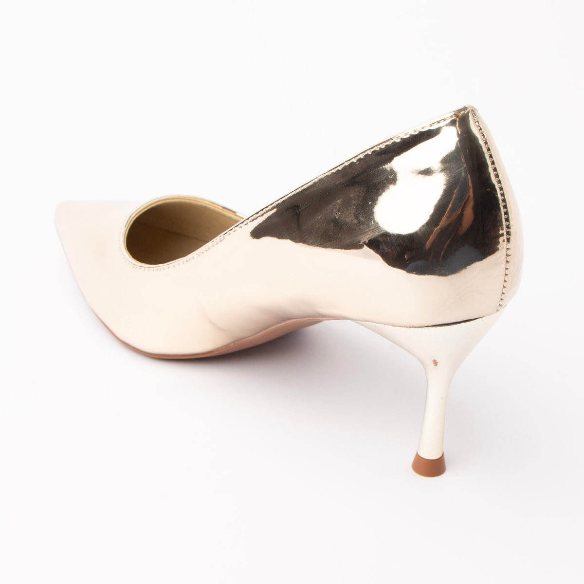 Gold pumps for women, back view showing the heel