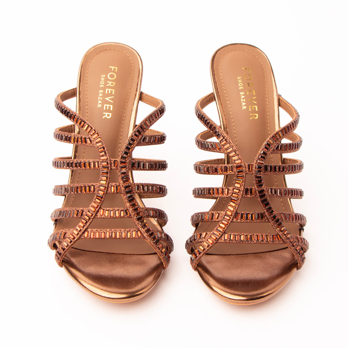 Brown mules for women, both shoes from the front