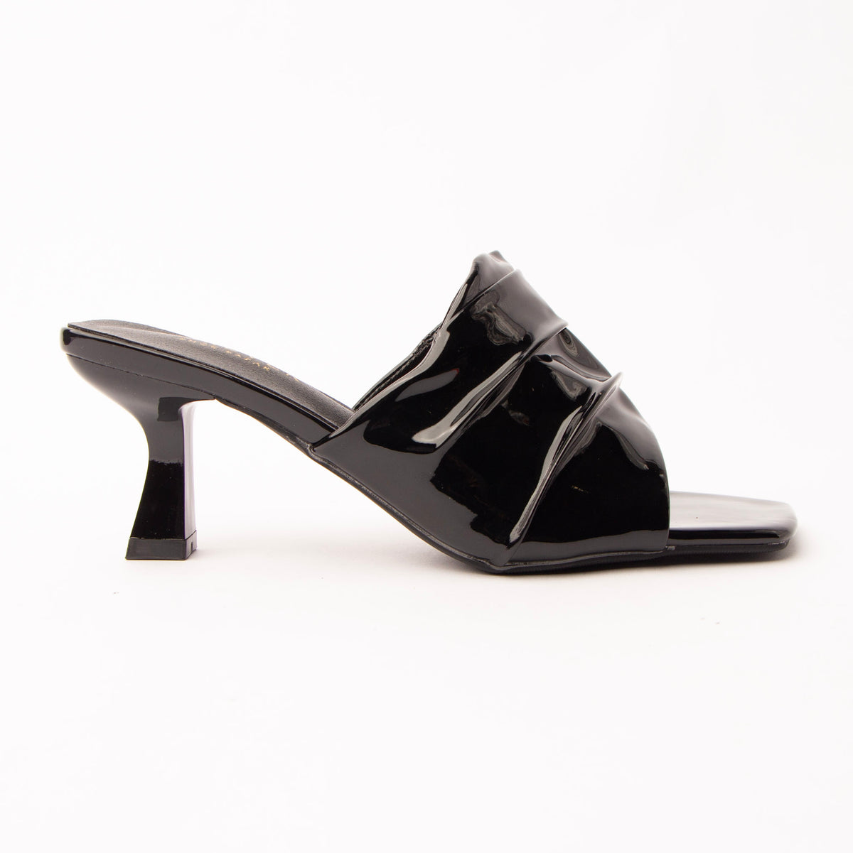 Black patent mules for women, a jet-black patent mule whose gathered instep band is split into three soft tiers by two slim raised straps, the lowest running diagonally across a wide square opening, on a slim flared spool heel in matching patent