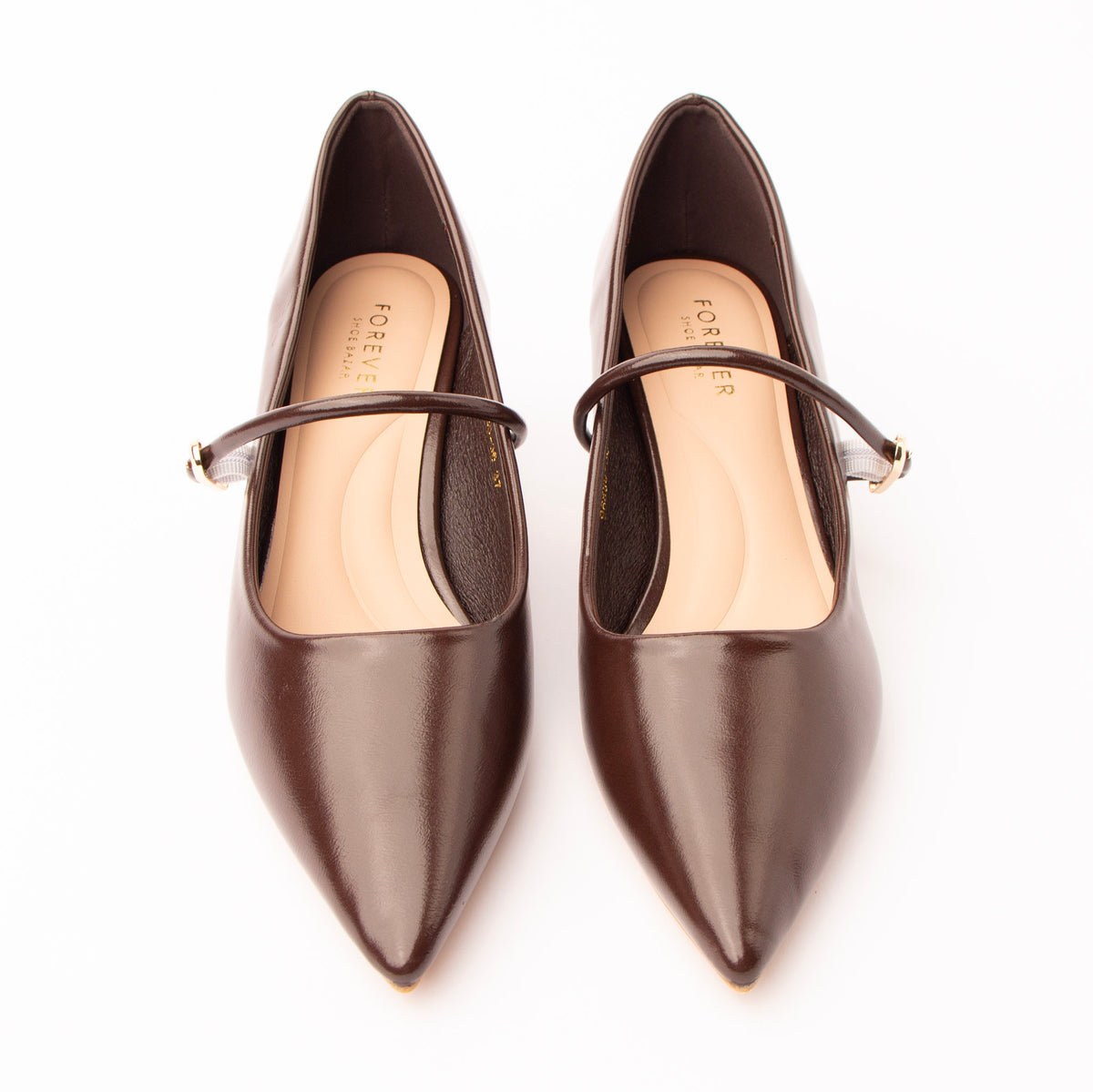 Brown mary jane kitten heels styled for everyday wear