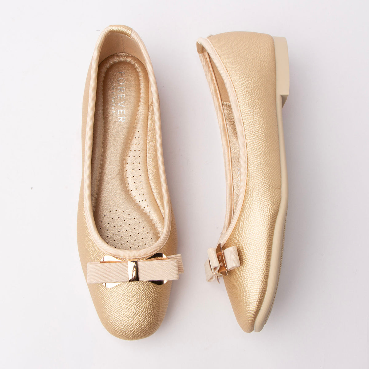 Gold bow ballerina flats for women with a cushioned footbed