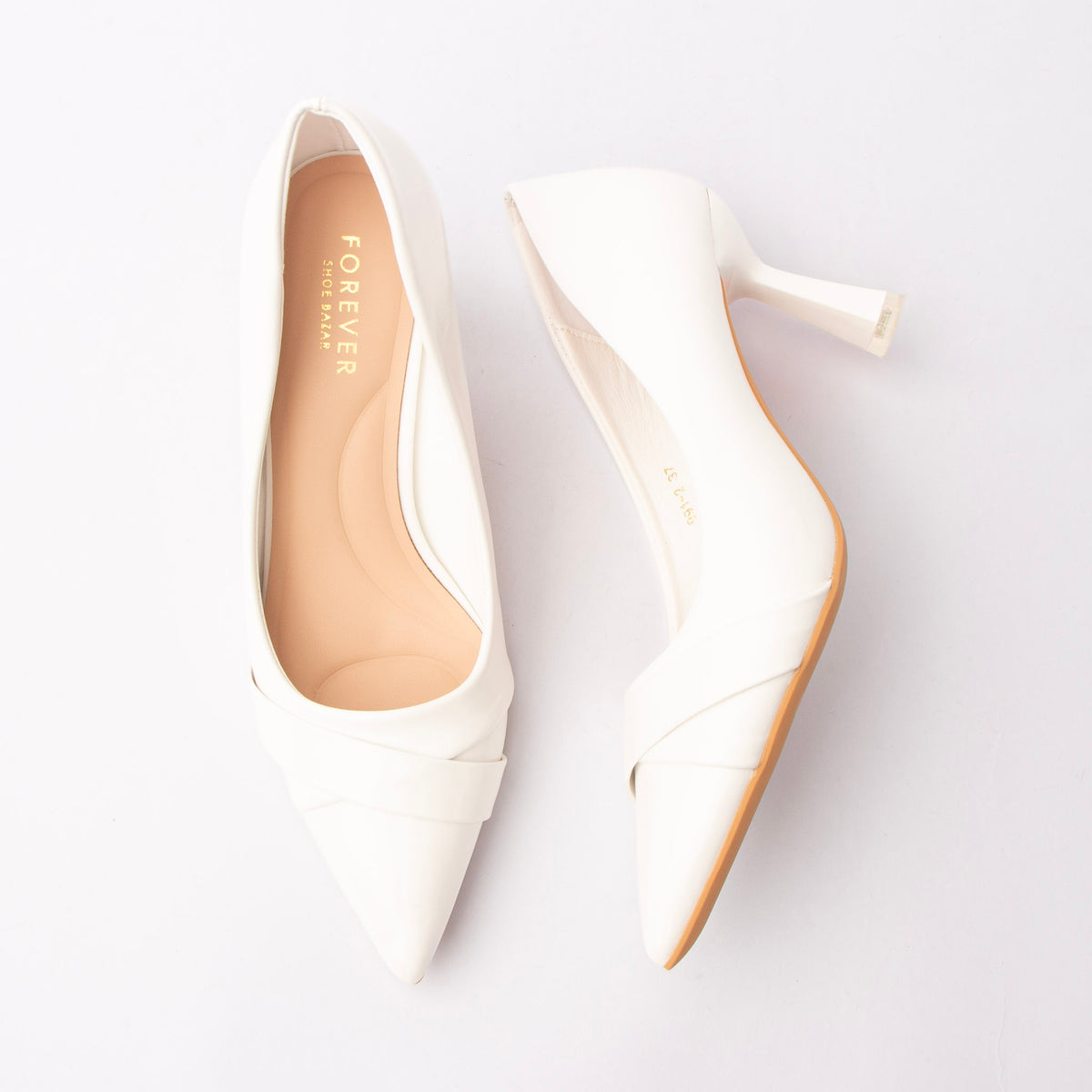 White folded strap pumps for women with a cushioned footbed