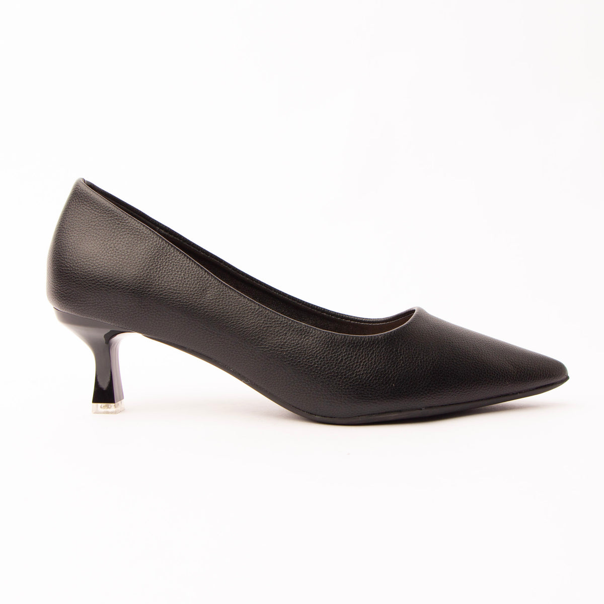 Black pointed kitten heels for women, a black pebble-grain court with a sharply pointed toe and a low-scooped topline, on a glossy black kitten heel finished with a small clear block at the tip