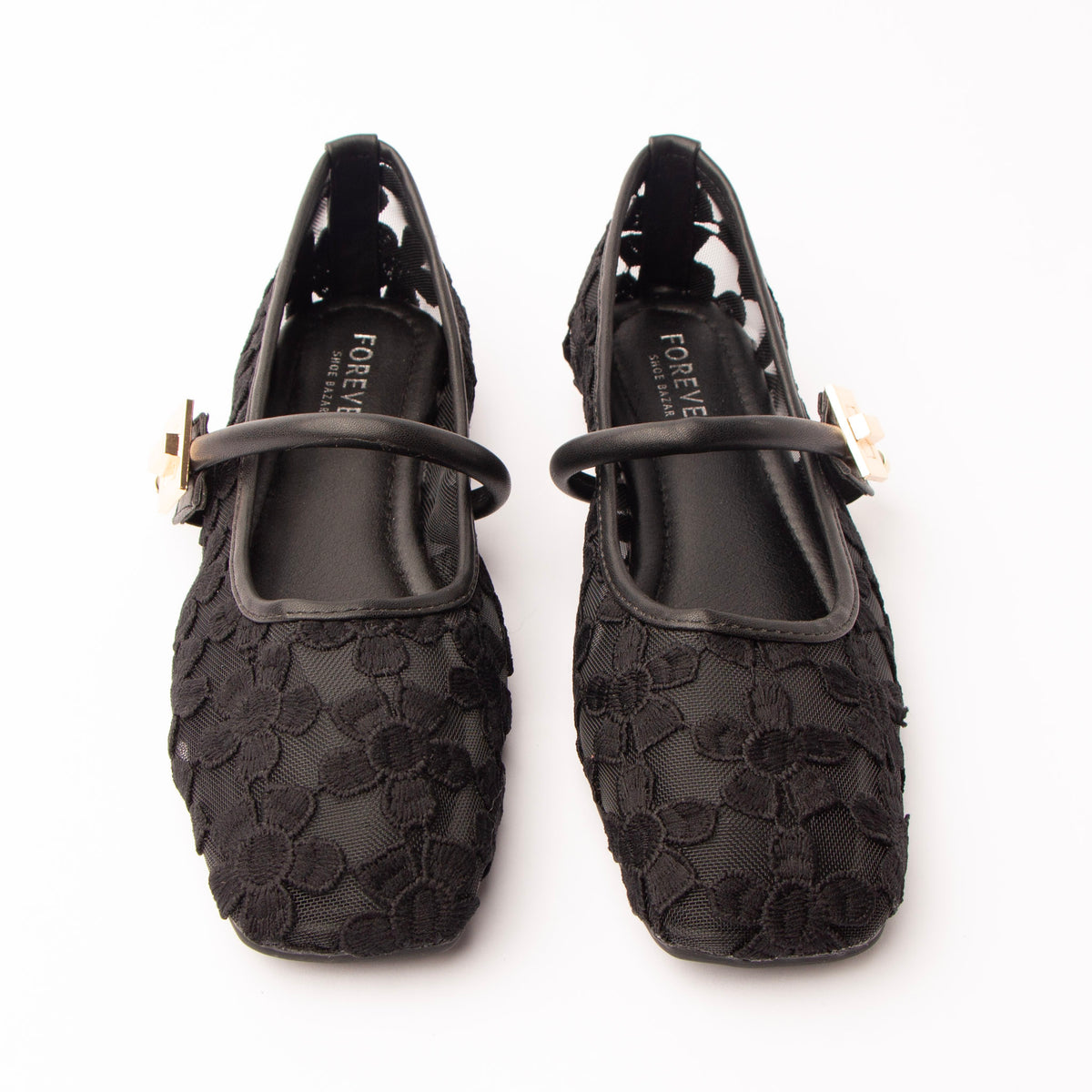 Black flats for women, both shoes from the front