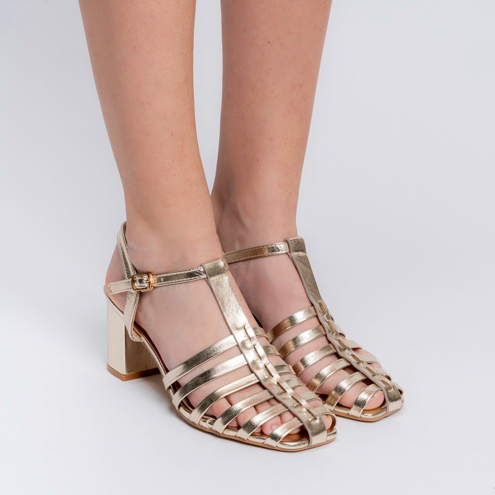 Gold caged block heel sandals for women with multiple straps