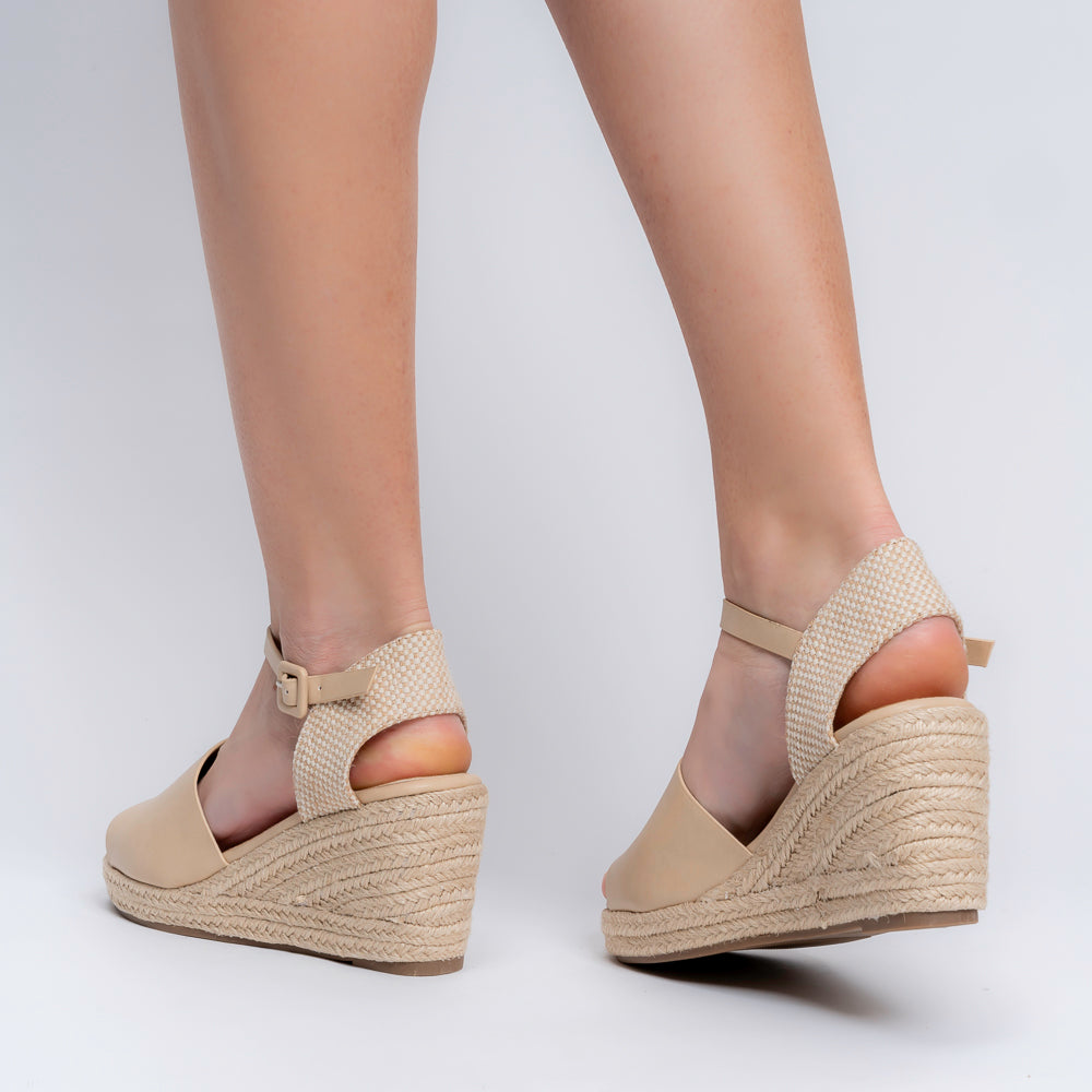 Beige jute wedge heels for women showing the woven platform detail