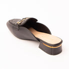Black quilted loafer mules for women, back view showing the heel