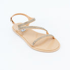 Nude flat sandals styled for casual wear