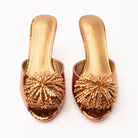 Brown mules for women, both shoes from the front