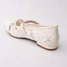 White Mary Janes for women, back view showing the heel