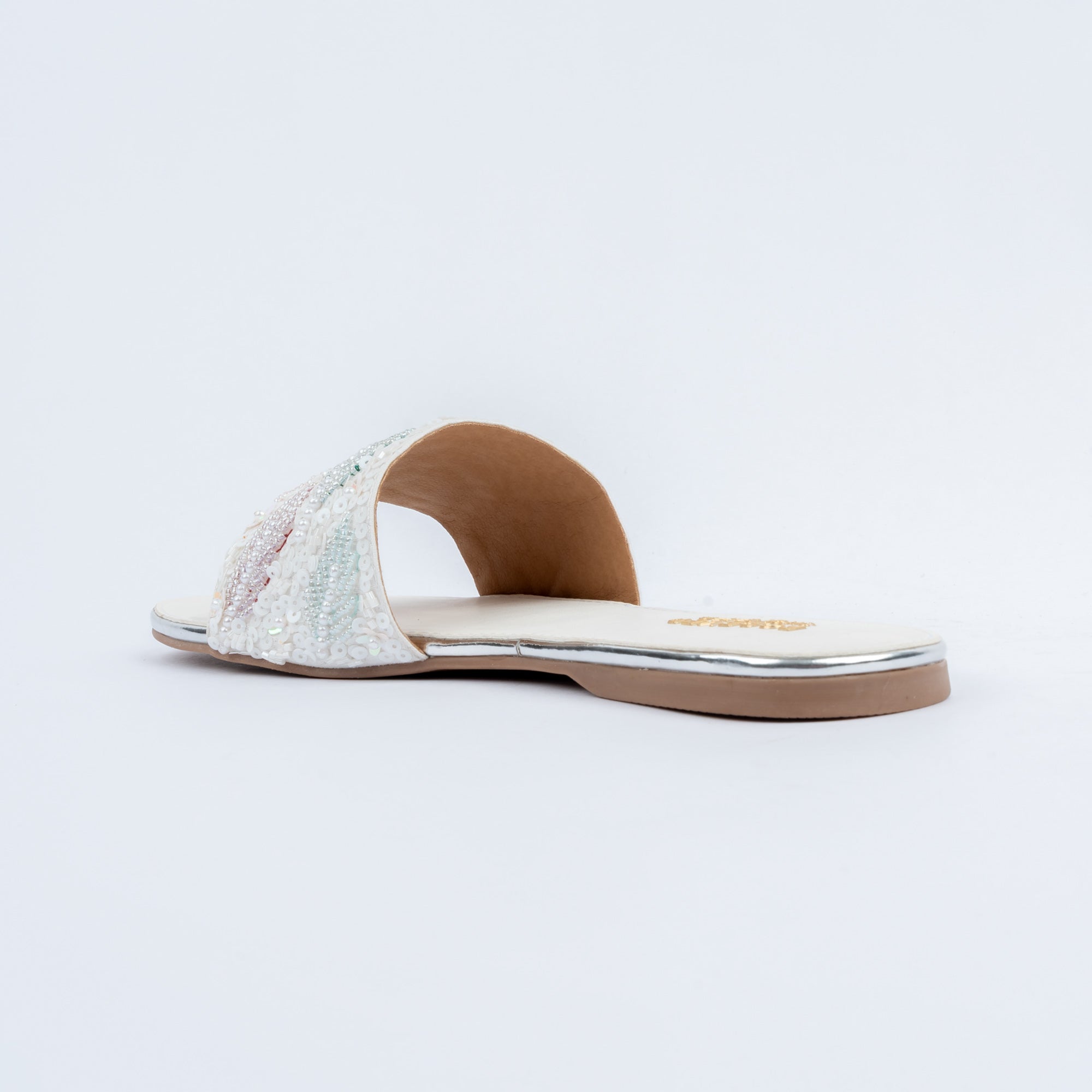 White flats for women with cushioned footbed, side view