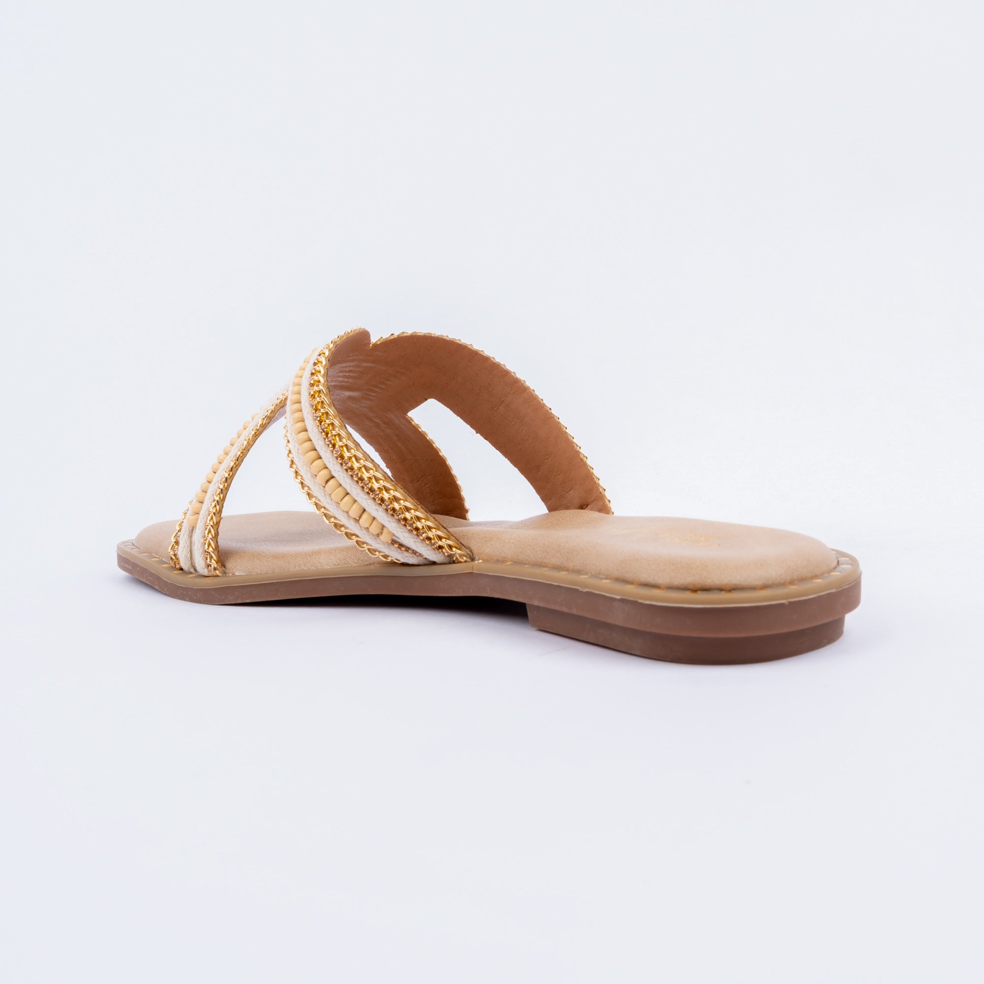Beige flats for women with cushioned footbed, side view