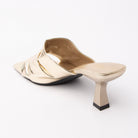 Gold metallic mules for women, back view showing the heel