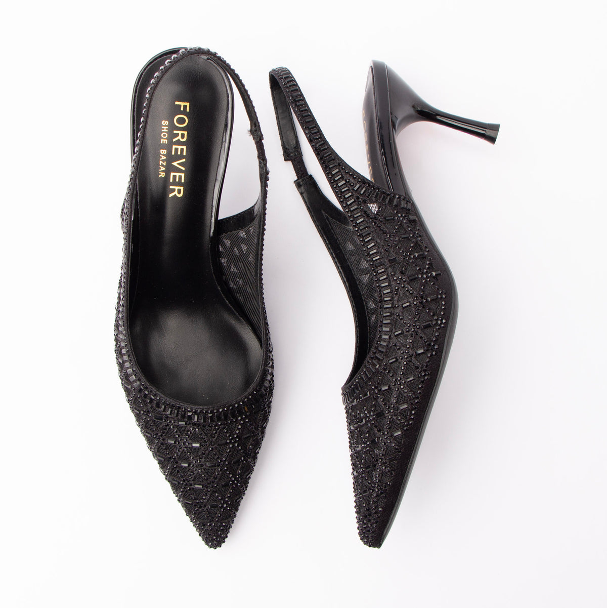Black pumps for women, both shoes laid flat