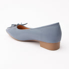 Blue pumps for women, back view showing the heel