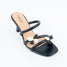 Black slim heel mules styled for casual wear