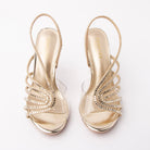 Gold sandals for women, both shoes from the front