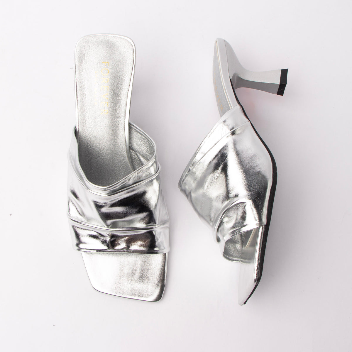 Silver metallic mules for women with a cushioned footbed
