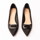 Black buckle court shoes styled for everyday wear