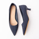 Blue check print kitten heels for women, a navy and slate windowpane check patterns the fabric upper of this plain pointed-toe court shoe, worn slip-on over a nude padded footbed, with a natural-edged sole and a slim flared kitten heel capped in silver