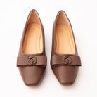 Brown pumps for women, both shoes from the front