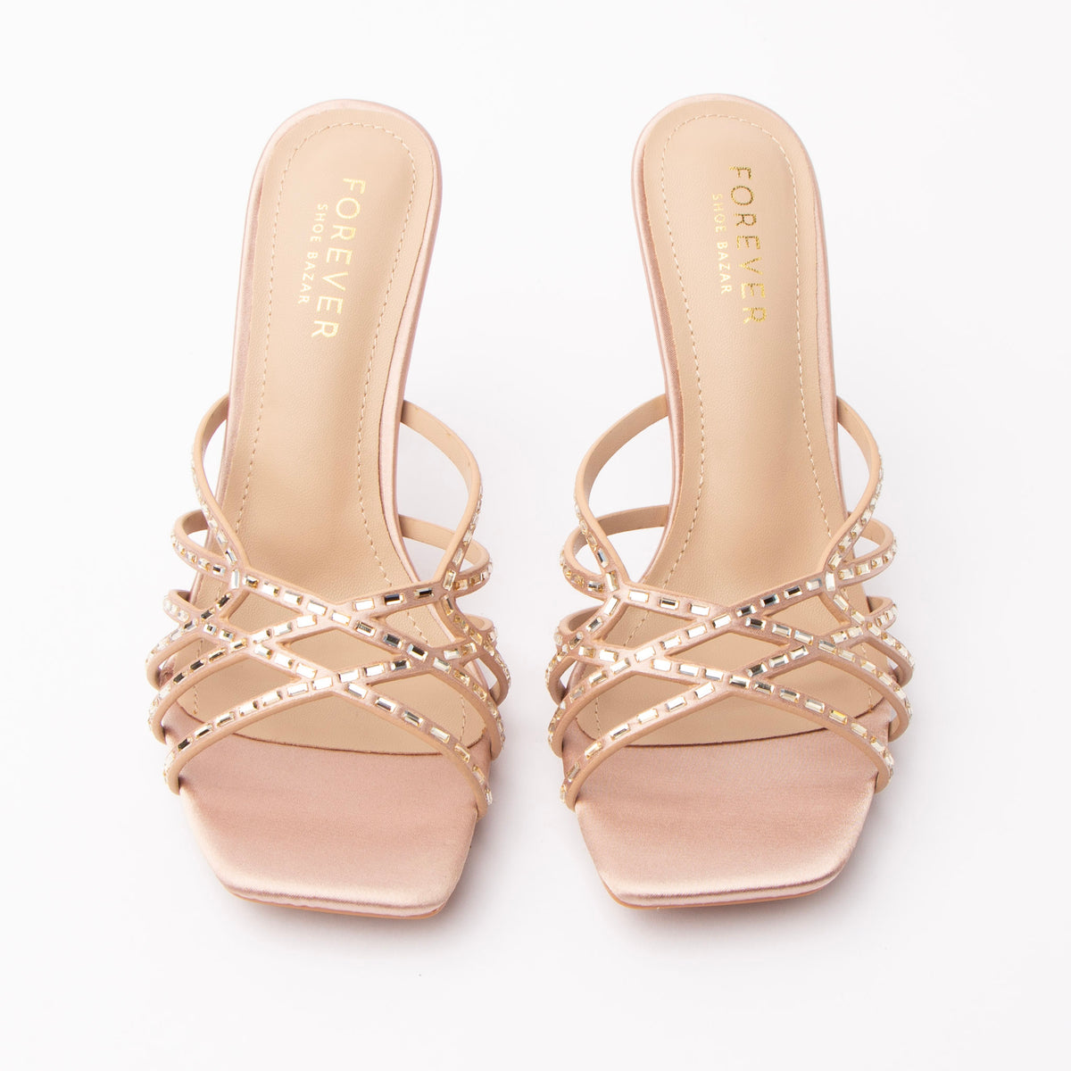 Nude mules for women, both shoes from the front