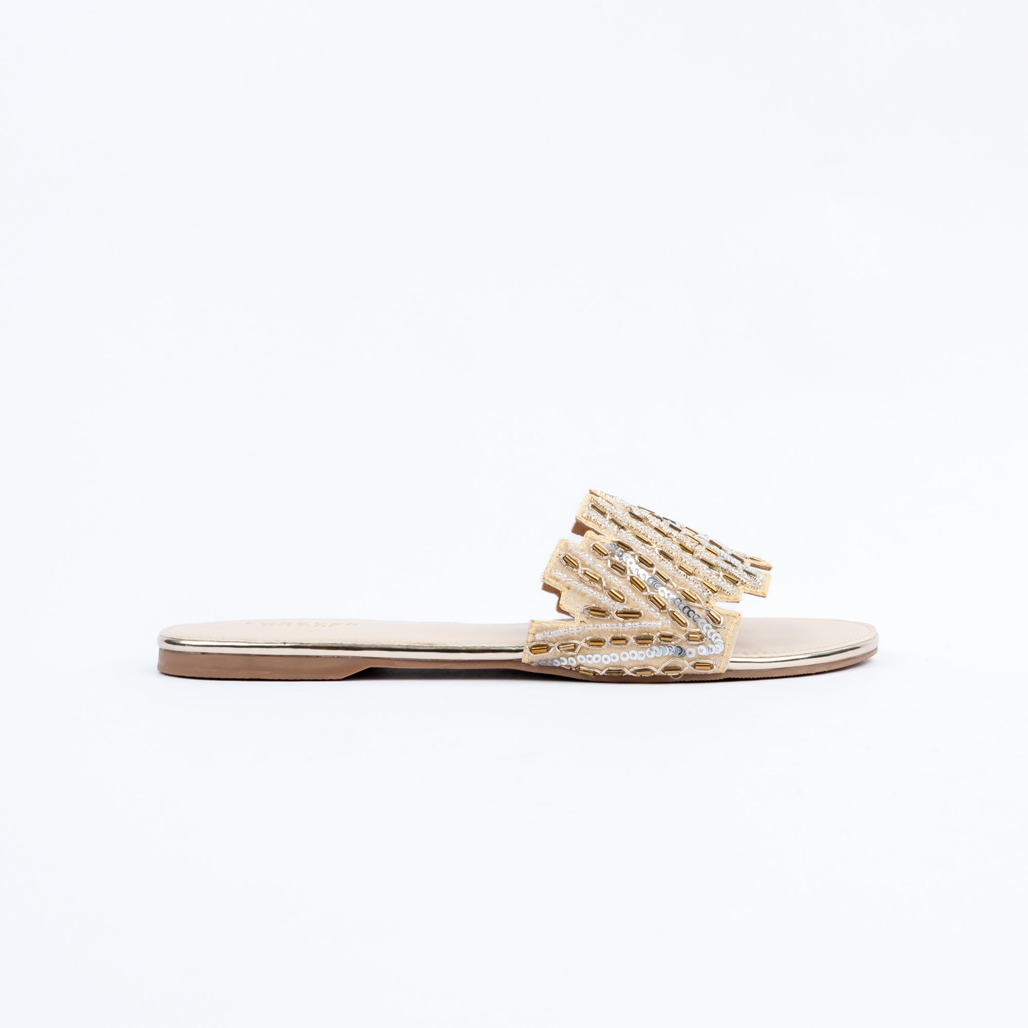 Gold flats for women with cushioned footbed, side view