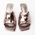Grey metallic mules styled for everyday wear