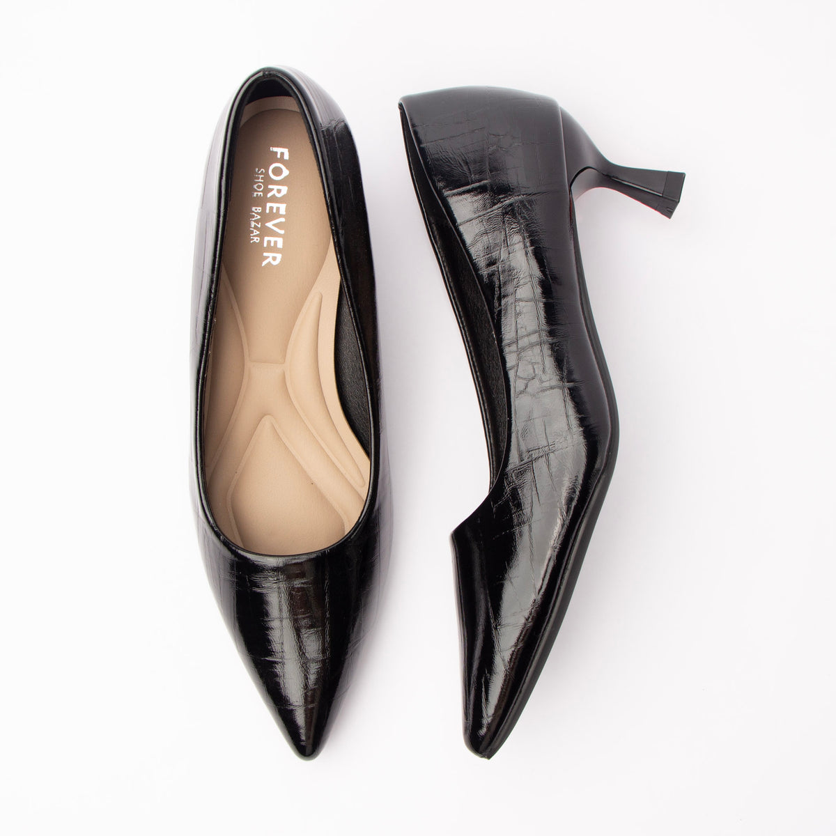 Black pumps for women, both shoes laid flat