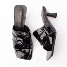 Black patent mules for women with a cushioned footbed