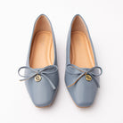 Blue pumps for women, both shoes from the front