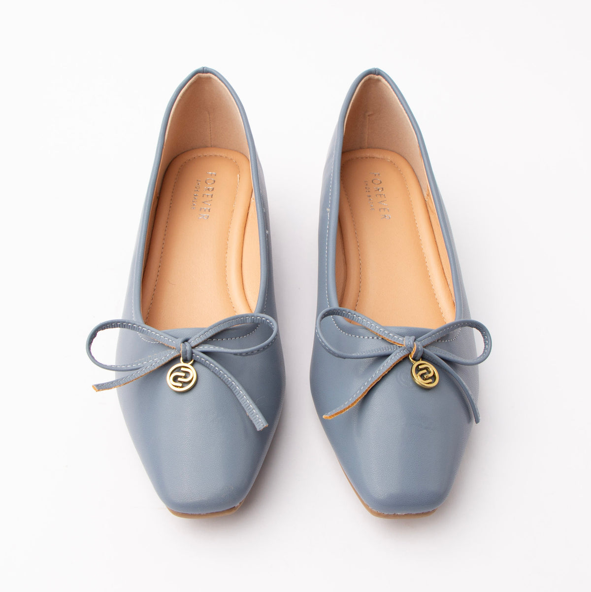 Blue pumps for women, both shoes from the front