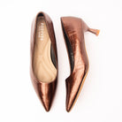 Brown pumps for women, both shoes laid flat