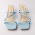 Blue mules for women, both shoes from the front