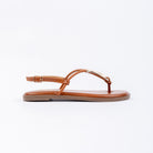Tan flat sandals for women with cushioned footbed, side view
