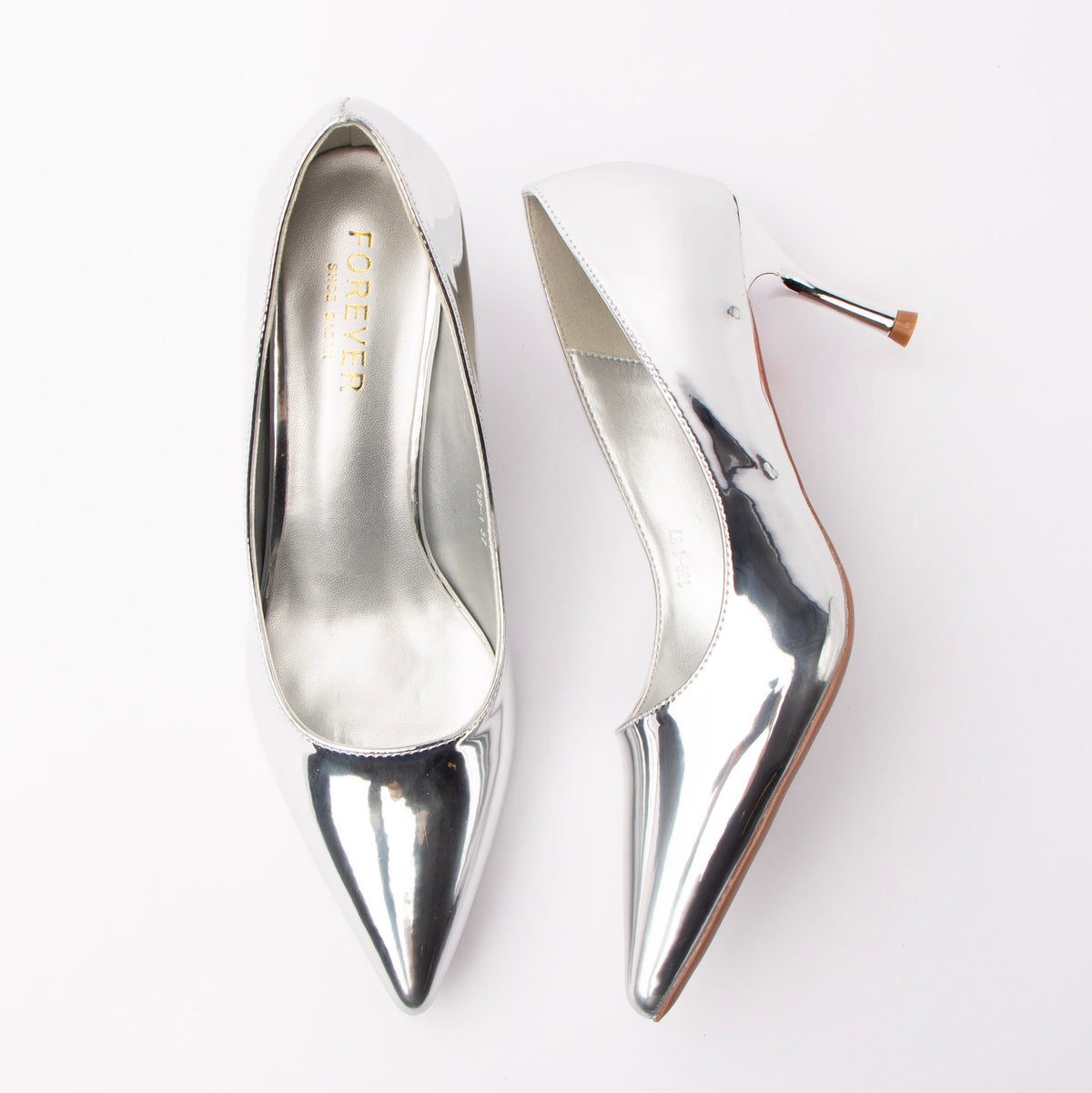 Silver pumps for women, both shoes laid flat
