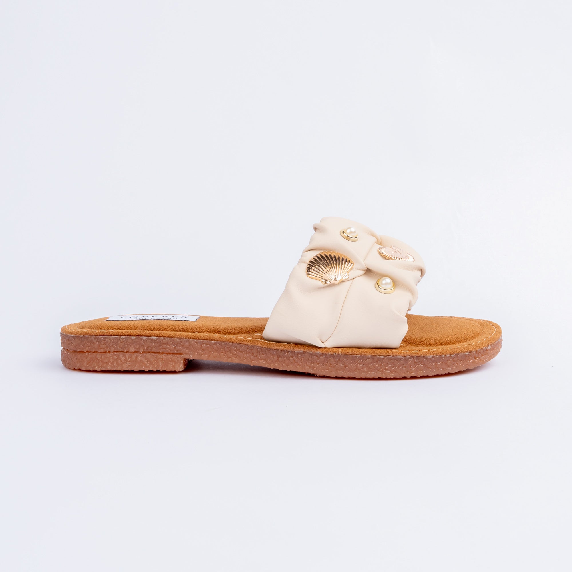 Beige ruched ballet flats styled for everyday casual wear