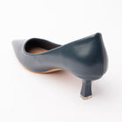 Blue pointed court shoes for women, back view showing the heel