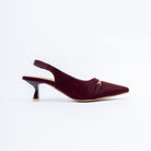 Maroon pumps styled for casual wear