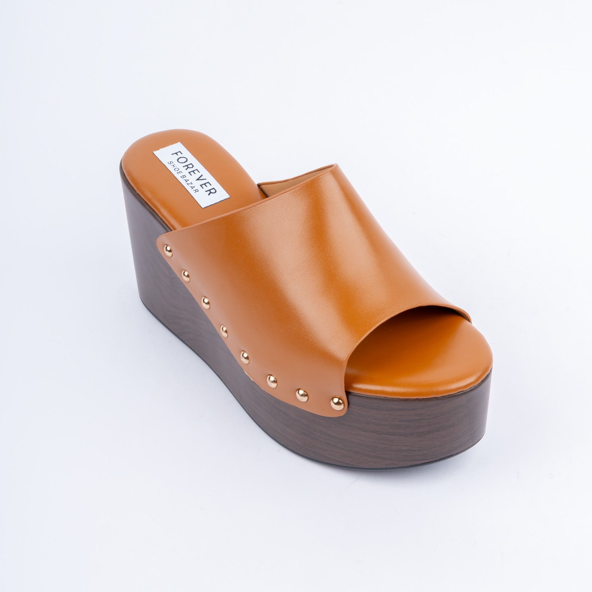 Camel wedge heel mules styled for casual wear