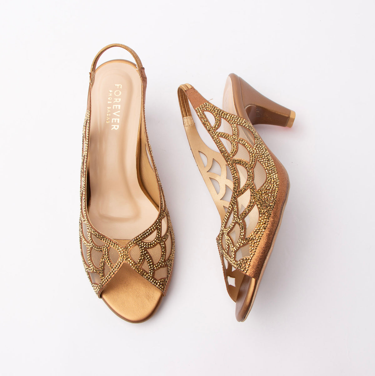 Copper embellished slingback pumps for women, dense gold-toned beadwork outlines a scalloped petal motif over nude mesh insets on a metallic bronze upper, with laser-cut teardrops through the quarter, a gathered elastic slingback strap, a tonal copper footbed and a polished bronze flared cone kitten heel