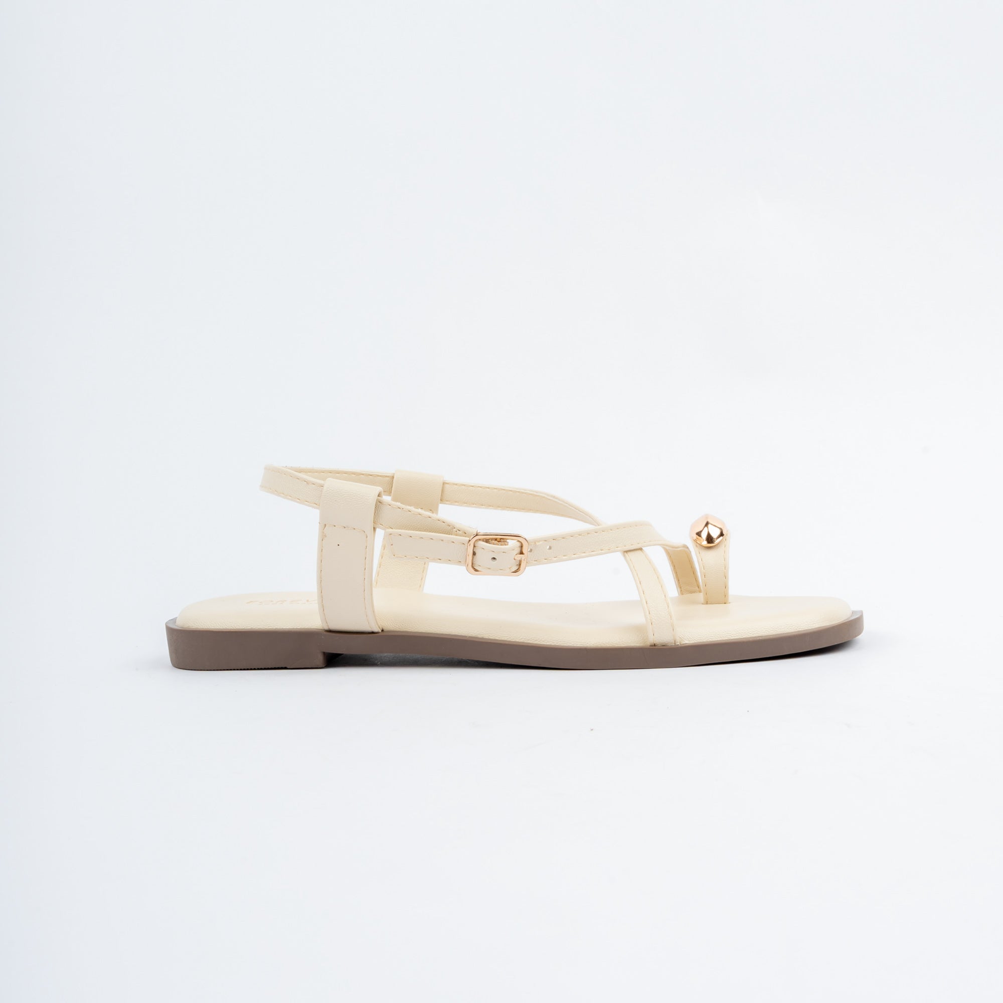 Cream flat sandals for women with cushioned footbed, side view